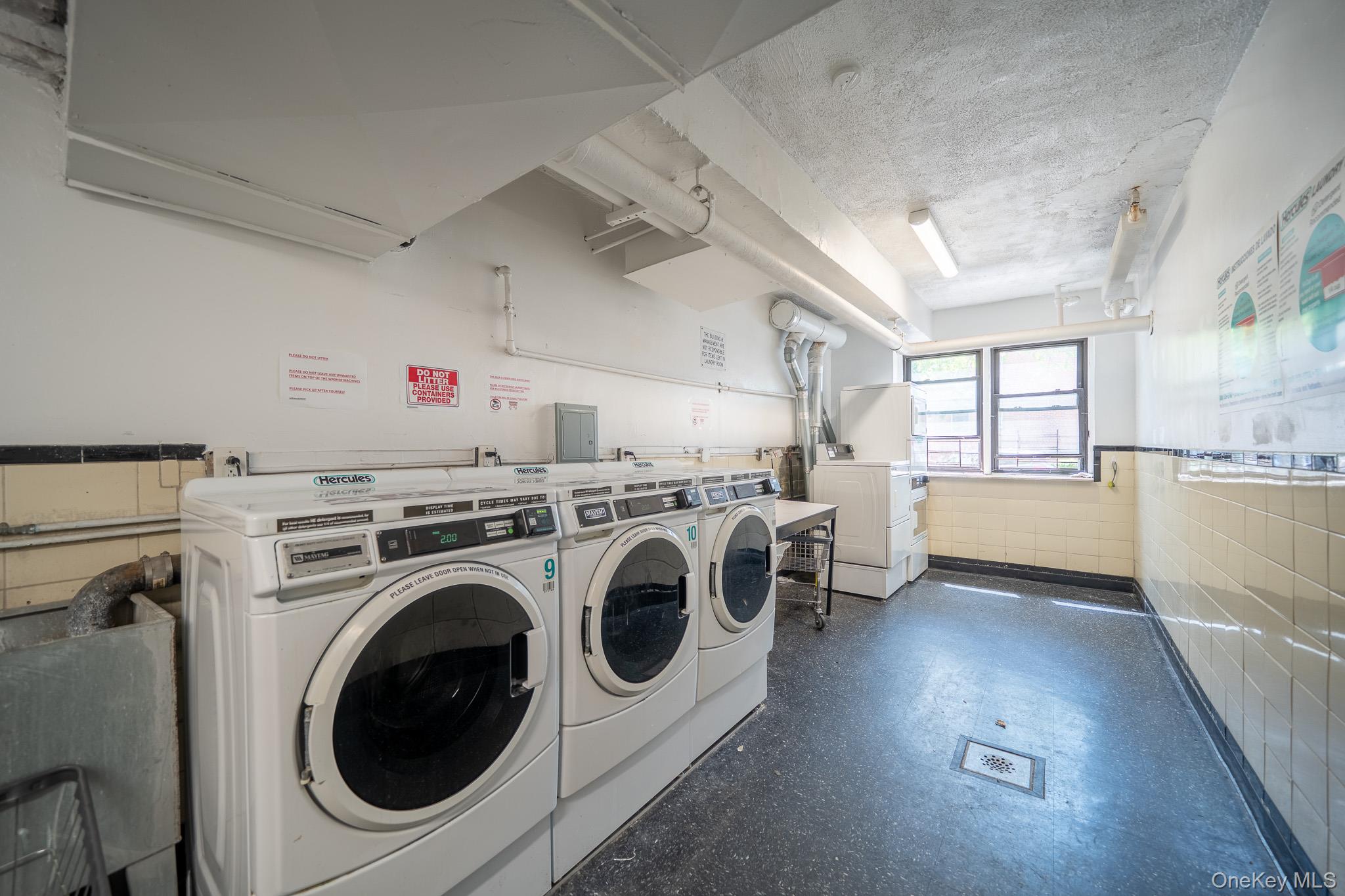 108-49 63rd Avenue, Unit 4A Queens, NY 11375 - Photo 9 of 10 a view of a storage & utility room with washer and dryer