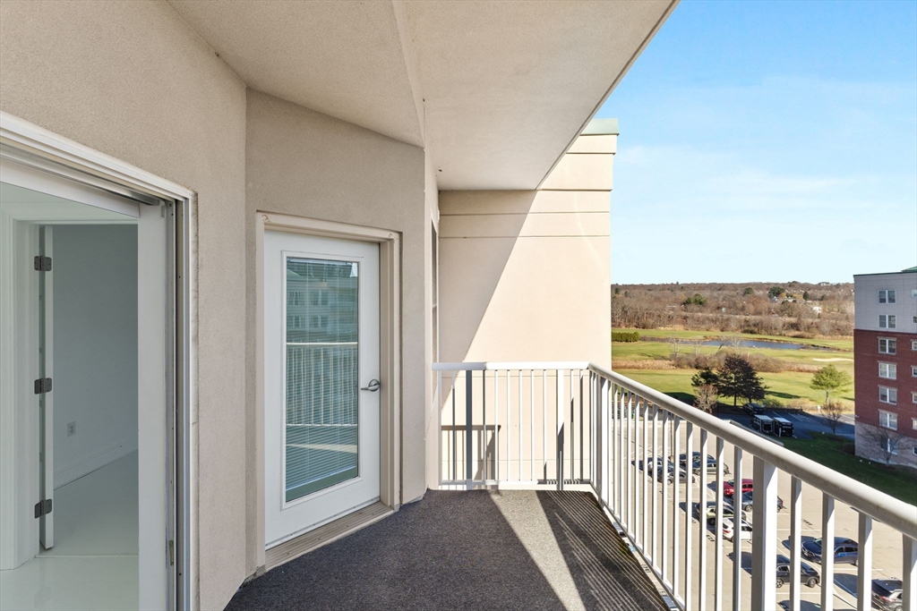36 Village Road, Unit 715 Middleton, MA 01949 - Photo 11 of 32 a view of a balcony with city view