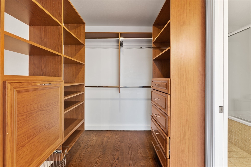 36 Village Road, Unit 715 Middleton, MA 01949 - Photo 16 of 32 a view of walk in closet with empty racks