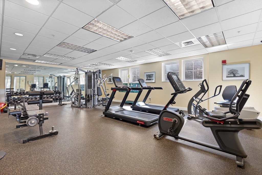 36 Village Road, Unit 715 Middleton, MA 01949 - Photo 24 of 32 a view of a room with gym equipment