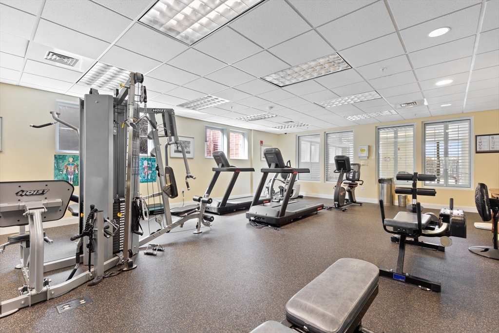 36 Village Road, Unit 715 Middleton, MA 01949 - Photo 25 of 32 a view of a room with gym equipment