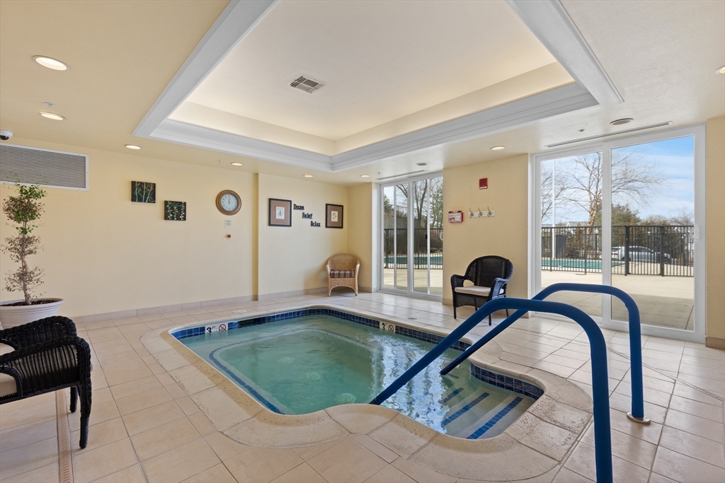 36 Village Road, Unit 715 Middleton, MA 01949 - Photo 26 of 32 a living room with furniture