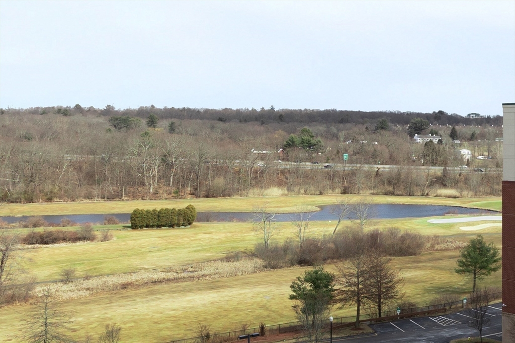 36 Village Road, Unit 715 Middleton, MA 01949 - Photo 29 of 32 a view of a lake with a mountain