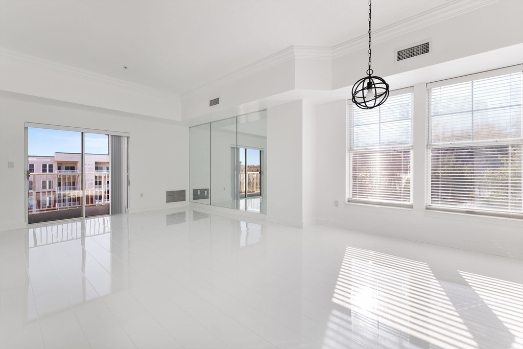36 Village Road, Unit 715 Middleton, MA 01949 - Photo 5 of 32 a view of an entryway with wooden floor