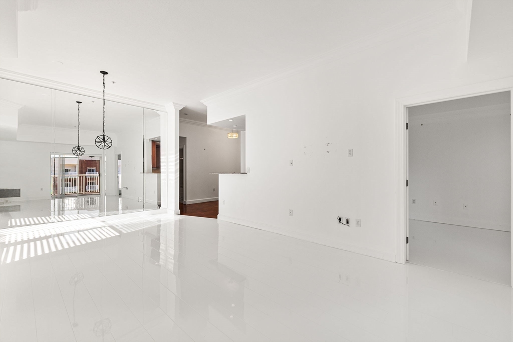 36 Village Road, Unit 715 Middleton, MA 01949 - Photo 7 of 32 a view of an empty room with a window