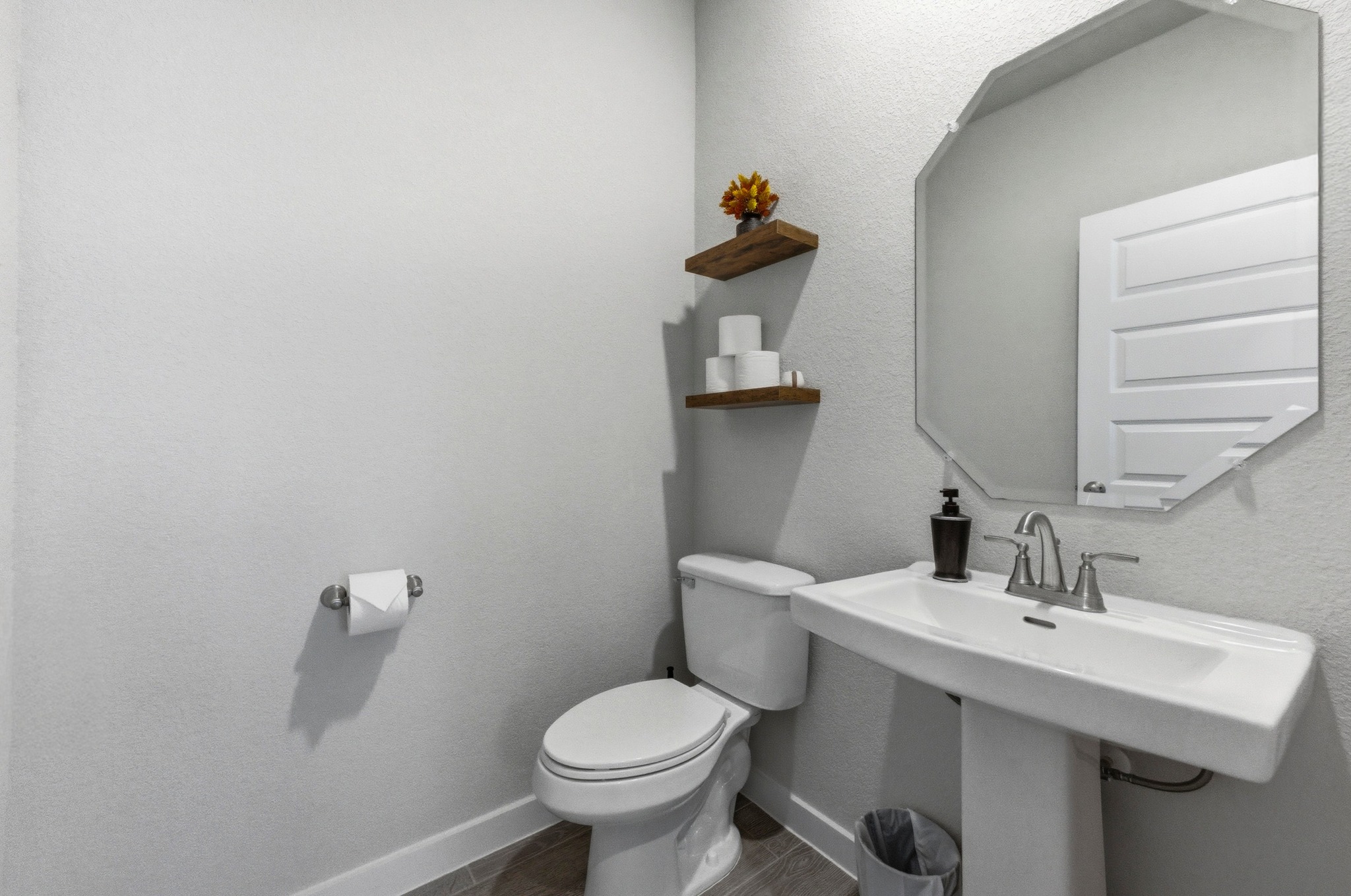 1209 Bluewood Bend Leander, TX 78641 - Photo 26 of 40 a bathroom with a sink toilet and a mirror