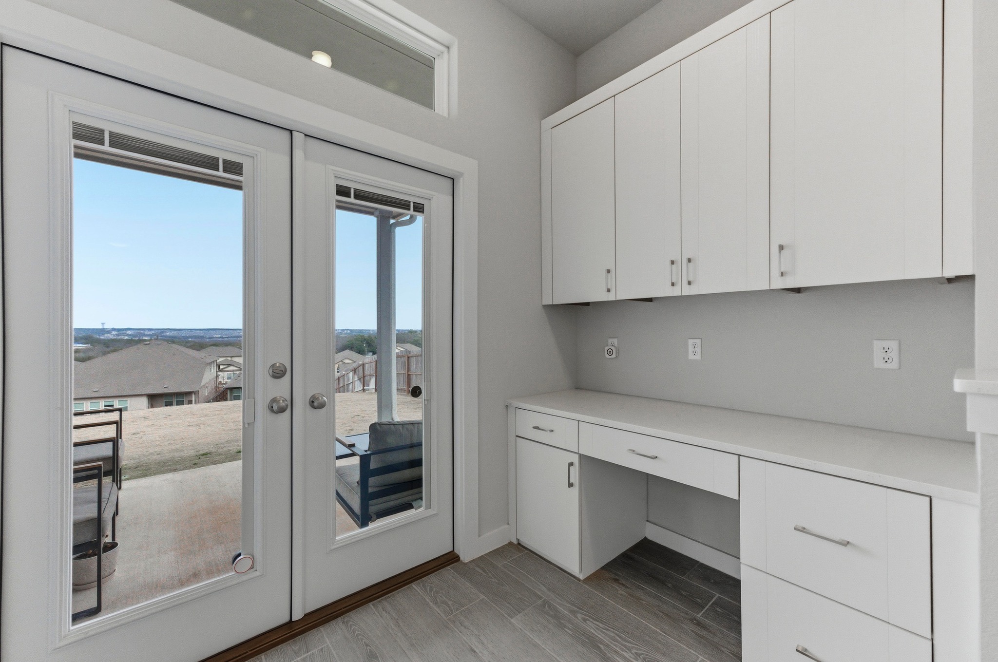 1209 Bluewood Bend Leander, TX 78641 - Photo 27 of 40 a view of cabinets and wooden floor
