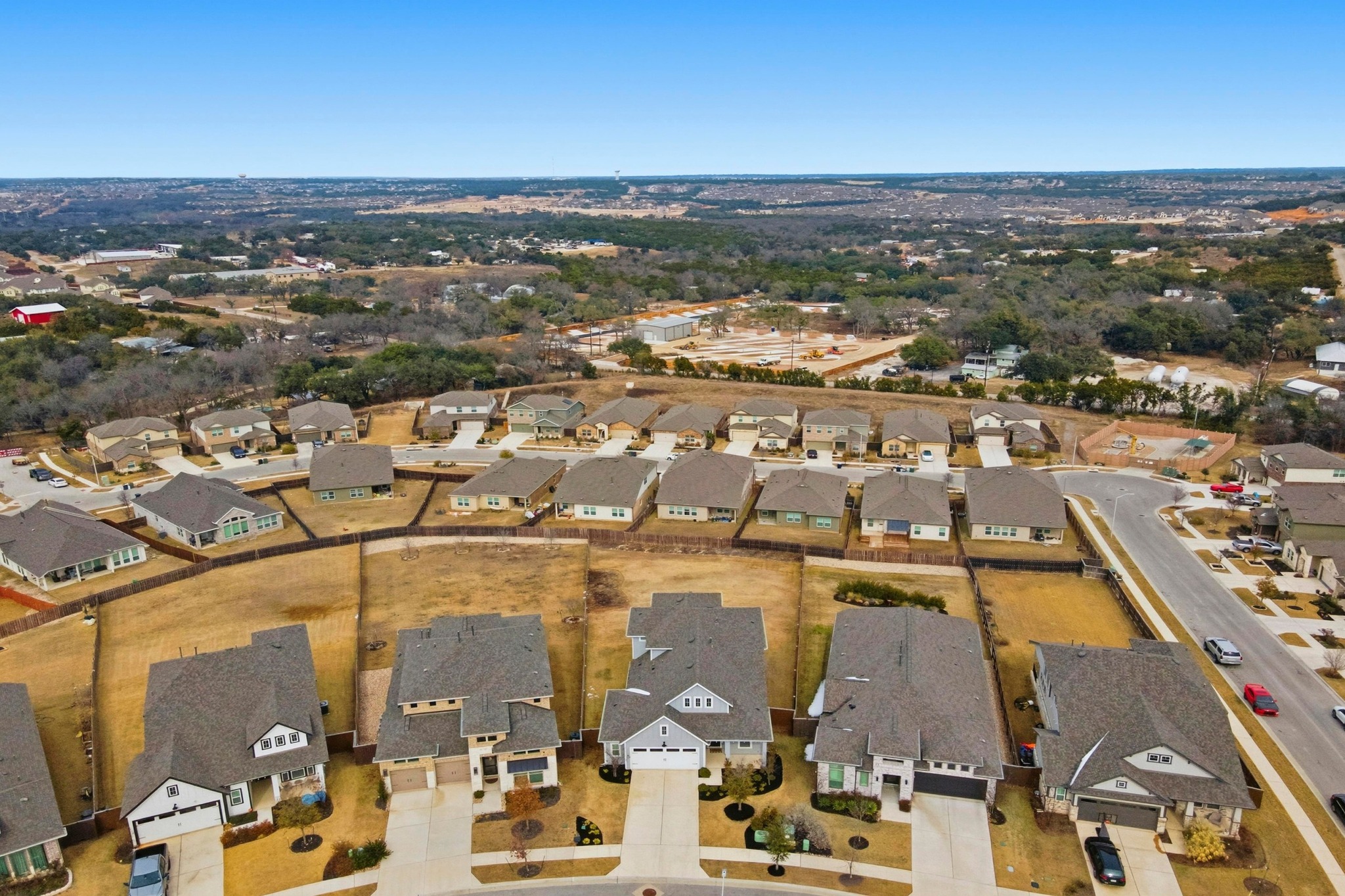 1209 Bluewood Bend Leander, TX 78641 - Photo 31 of 40 an aerial view of residential building with parking