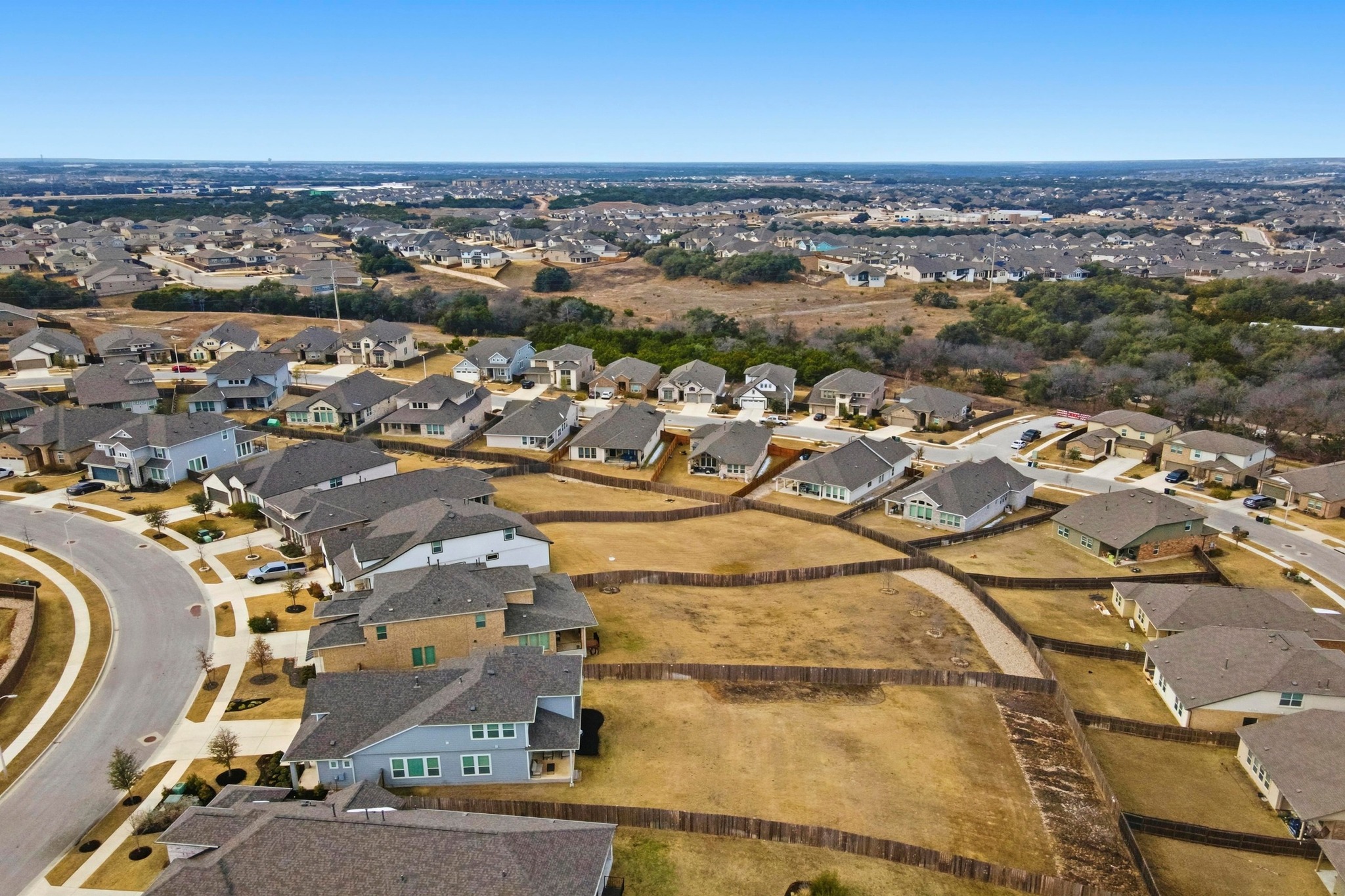 1209 Bluewood Bend Leander, TX 78641 - Photo 32 of 40 an aerial view of residential houses with outdoor space