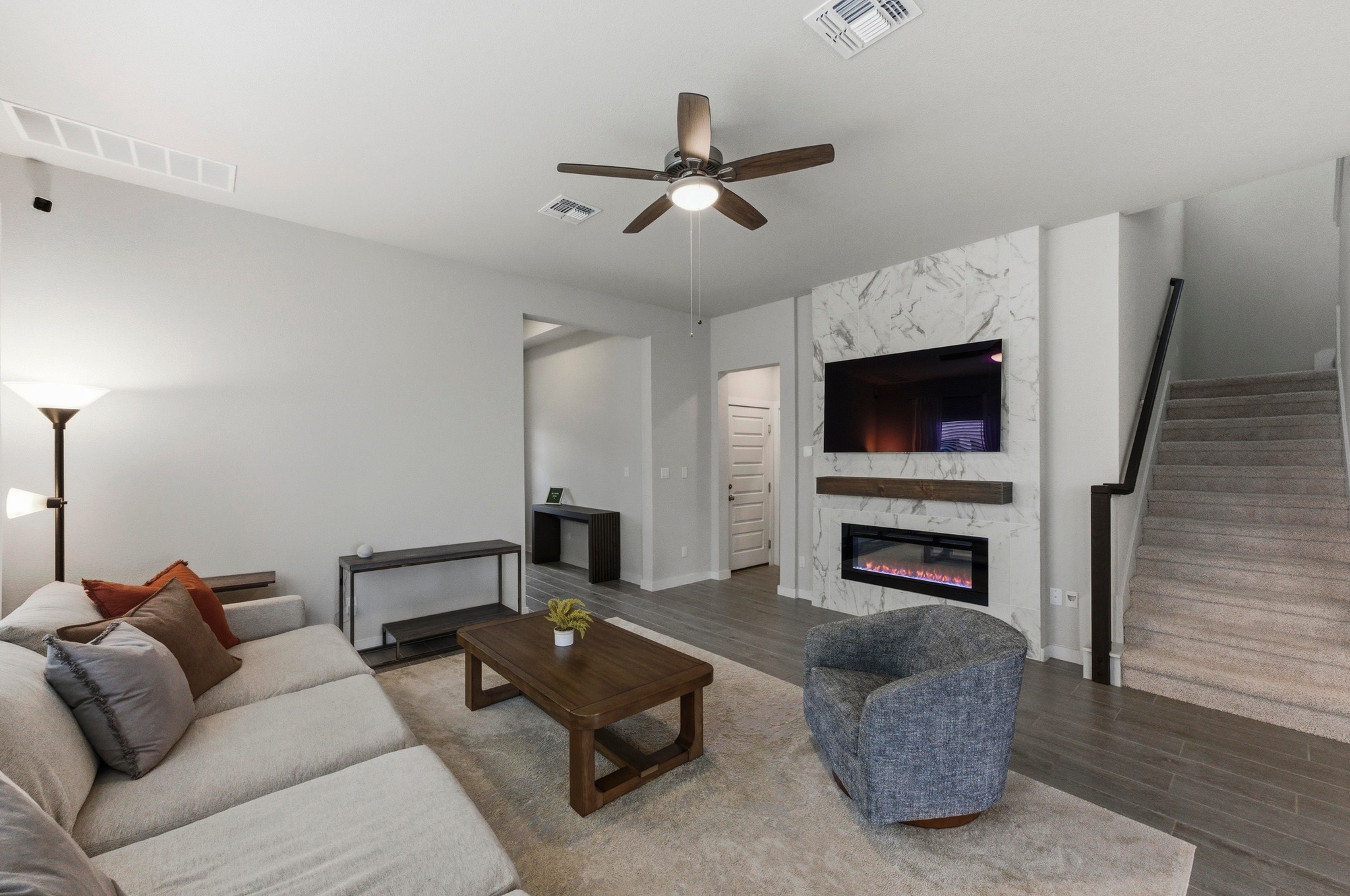 1209 Bluewood Bend Leander, TX 78641 - Photo 6 of 40 a living room with furniture and a fireplace