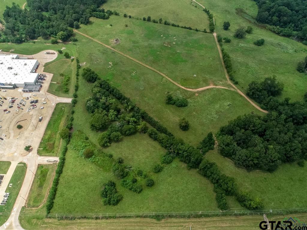 149 Northwest Carthage Tx 75633 Carthage, TX 75633 - Photo 3 of 8 an aerial view of a residential houses with outdoor space