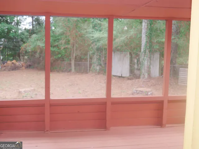 a view of a glass door of the house