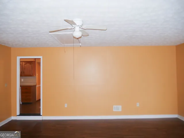 a kitchen that has a sink and a stove
