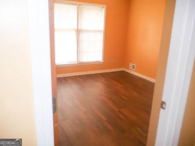 a bathroom with a shower and a toilet