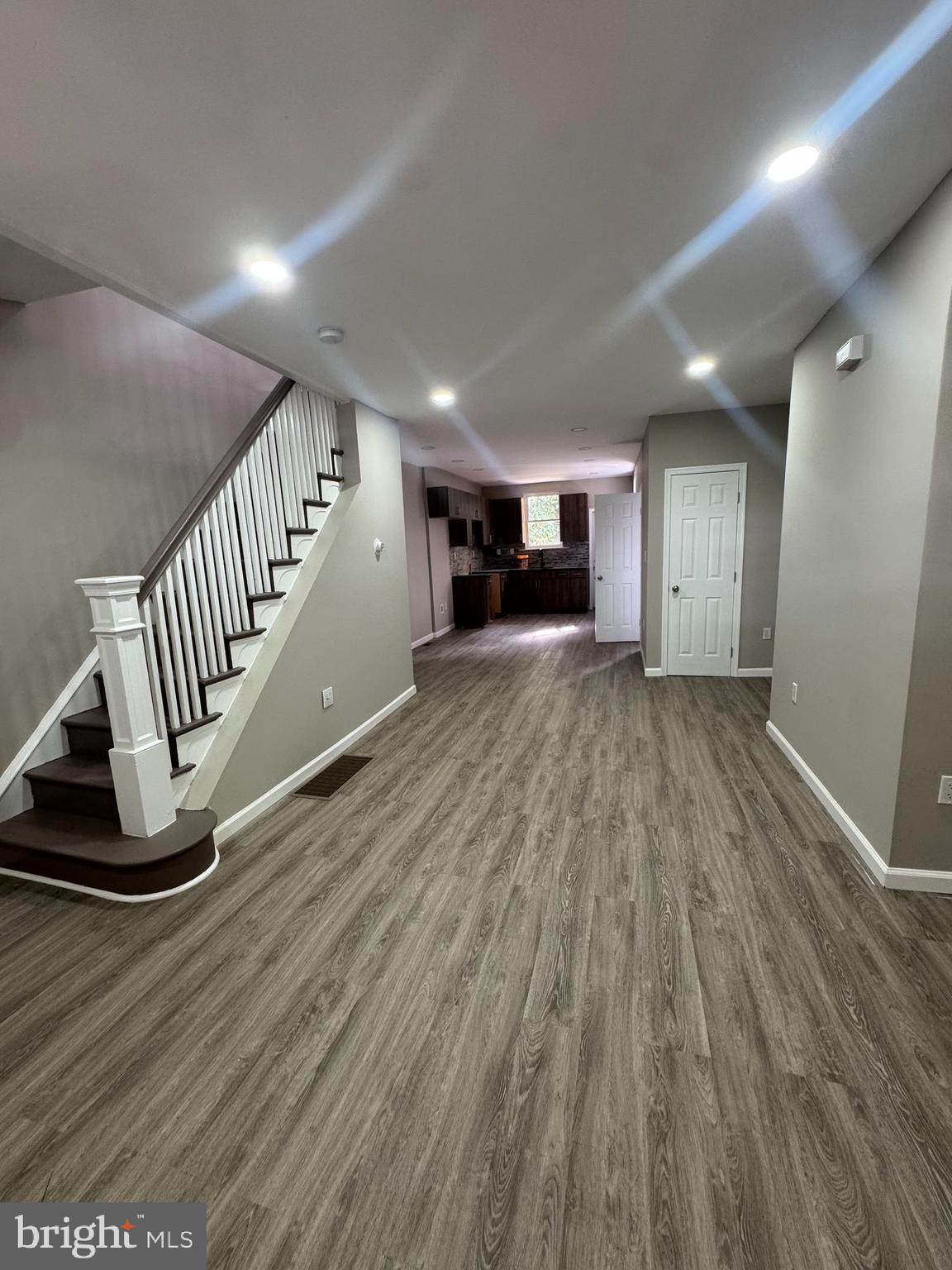 6018 Ross Street Philadelphia, PA 19144 - Photo 2 of 14 a view of a livingroom with wooden floor and staircase