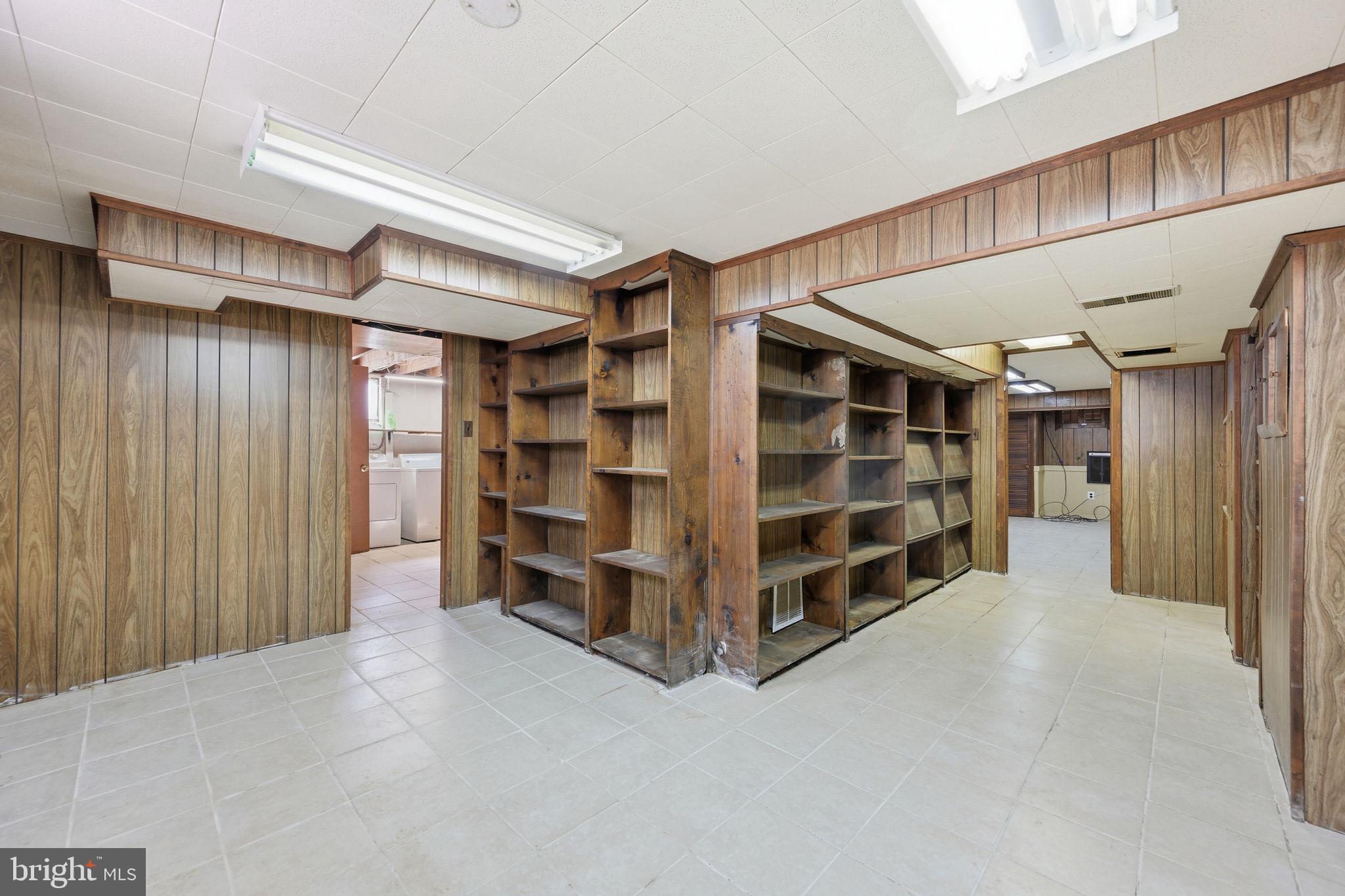 703 Northwest Drive Silver Spring, MD 20901 - Photo 18 of 25 a view of an empty room with a staircase