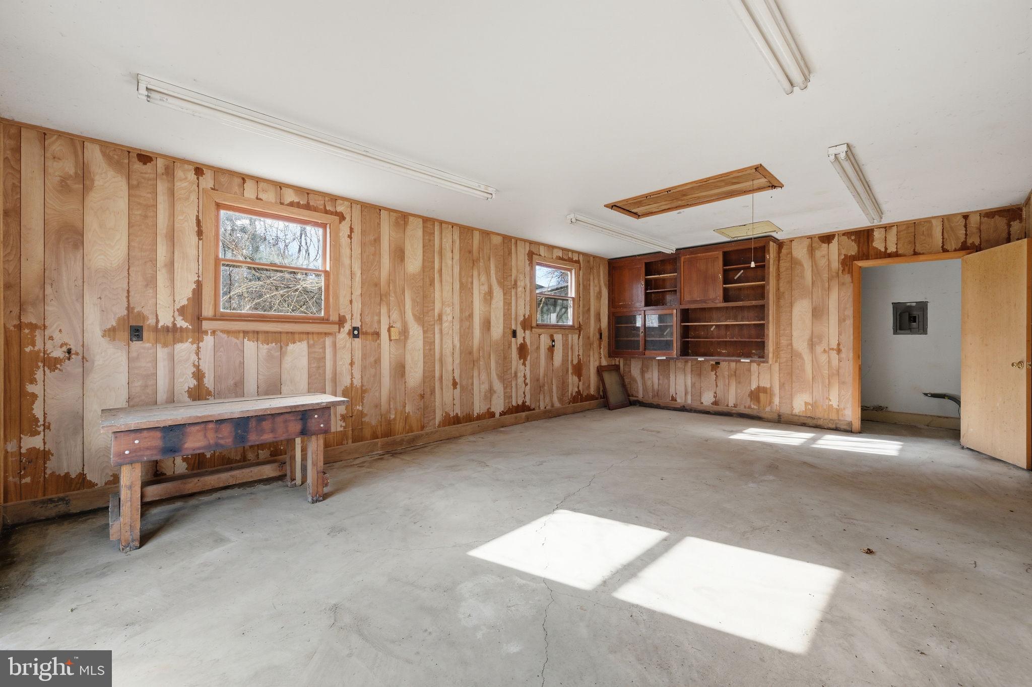 703 Northwest Drive Silver Spring, MD 20901 - Photo 19 of 25 a view of a livingroom with furniture and a window