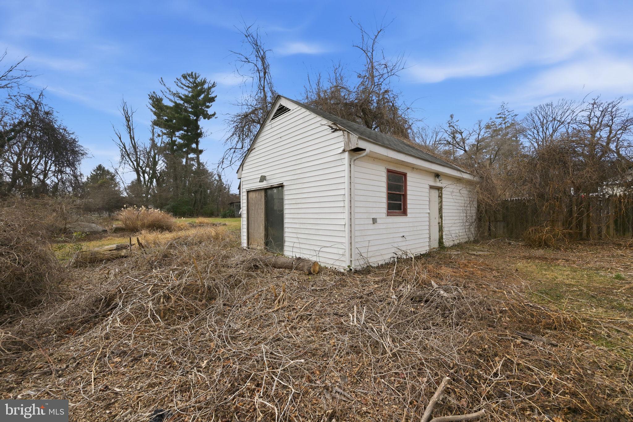 703 Northwest Drive Silver Spring, MD 20901 - Photo 25 of 25 a view of a backyard with large trees