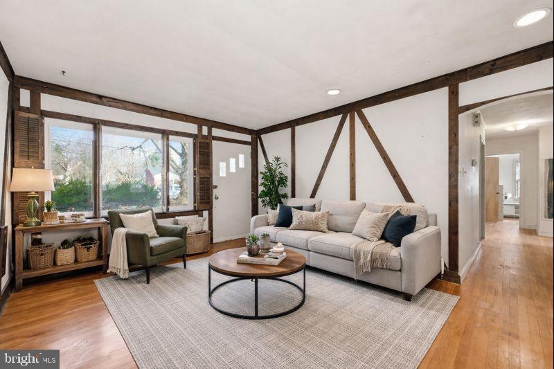 703 Northwest Drive Silver Spring, MD 20901 - Photo 3 of 25 a living room with furniture and a large window