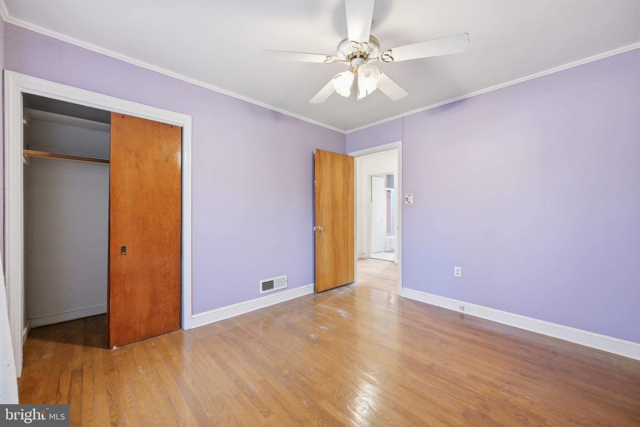 703 Northwest Drive Silver Spring, MD 20901 - Photo 8 of 25 a view of an empty room with a chandelier