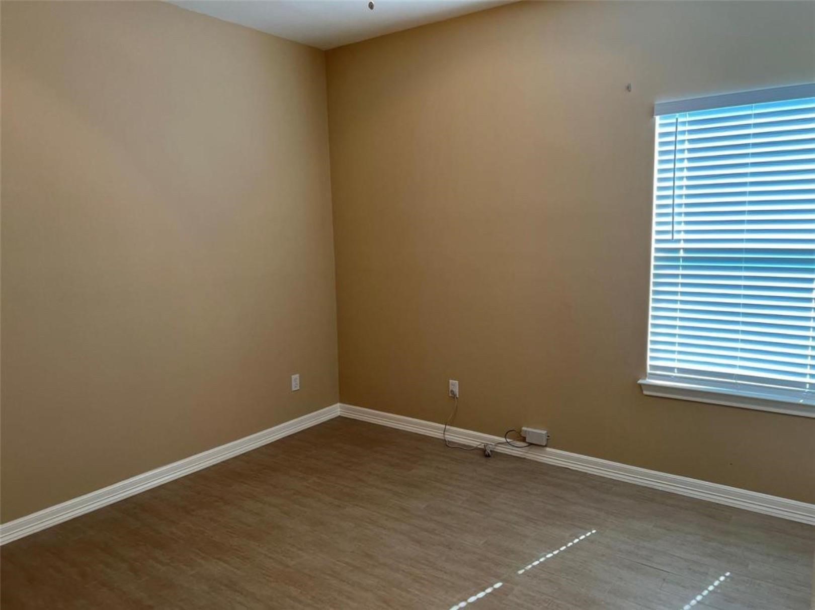 4733 16th Street Bacliff, TX 77518 - Photo 10 of 11 an empty room with a workbench