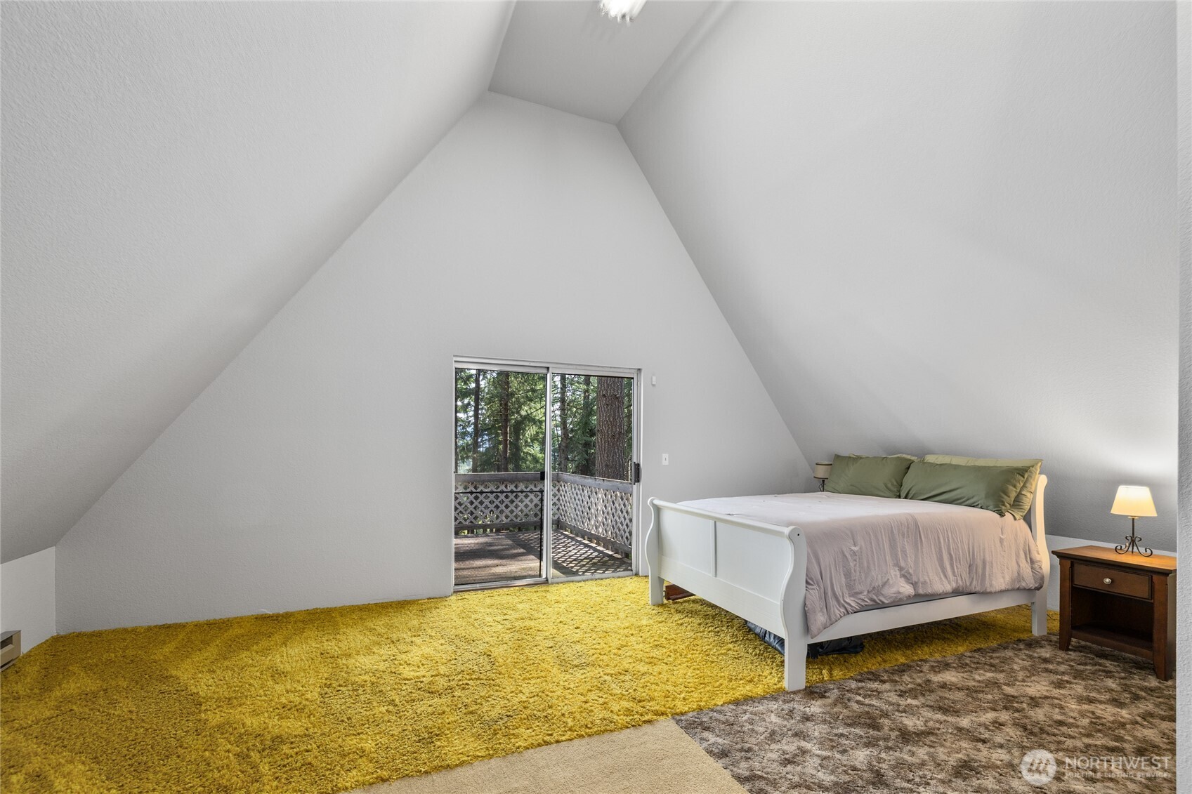 211 Indian Hill Road Cle Elum, WA 98922 - Photo 17 of 36 a bedroom with a bed and a window