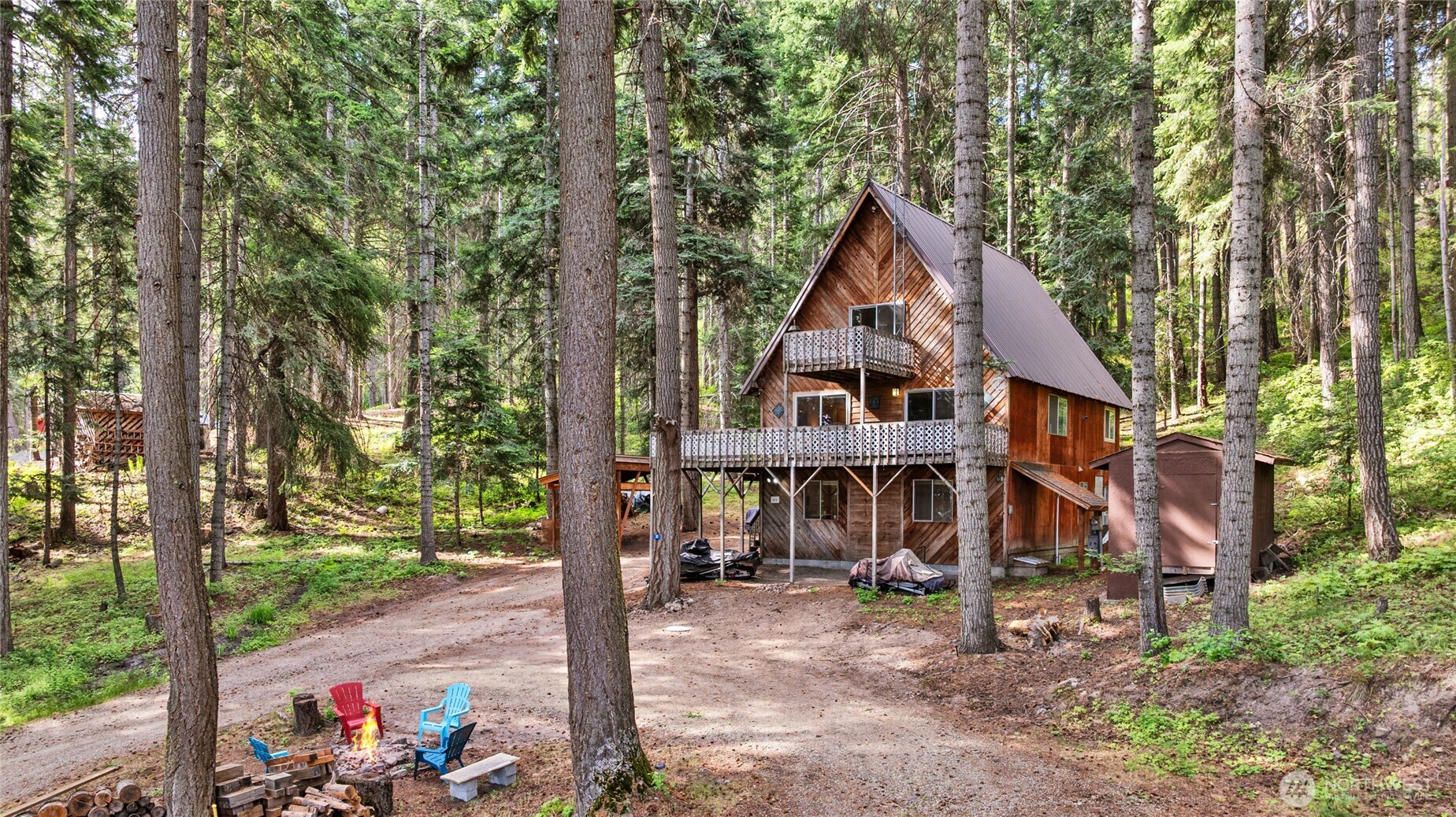211 Indian Hill Road Cle Elum, WA 98922 - Photo 34 of 36 a view of a house with a yard and balcony