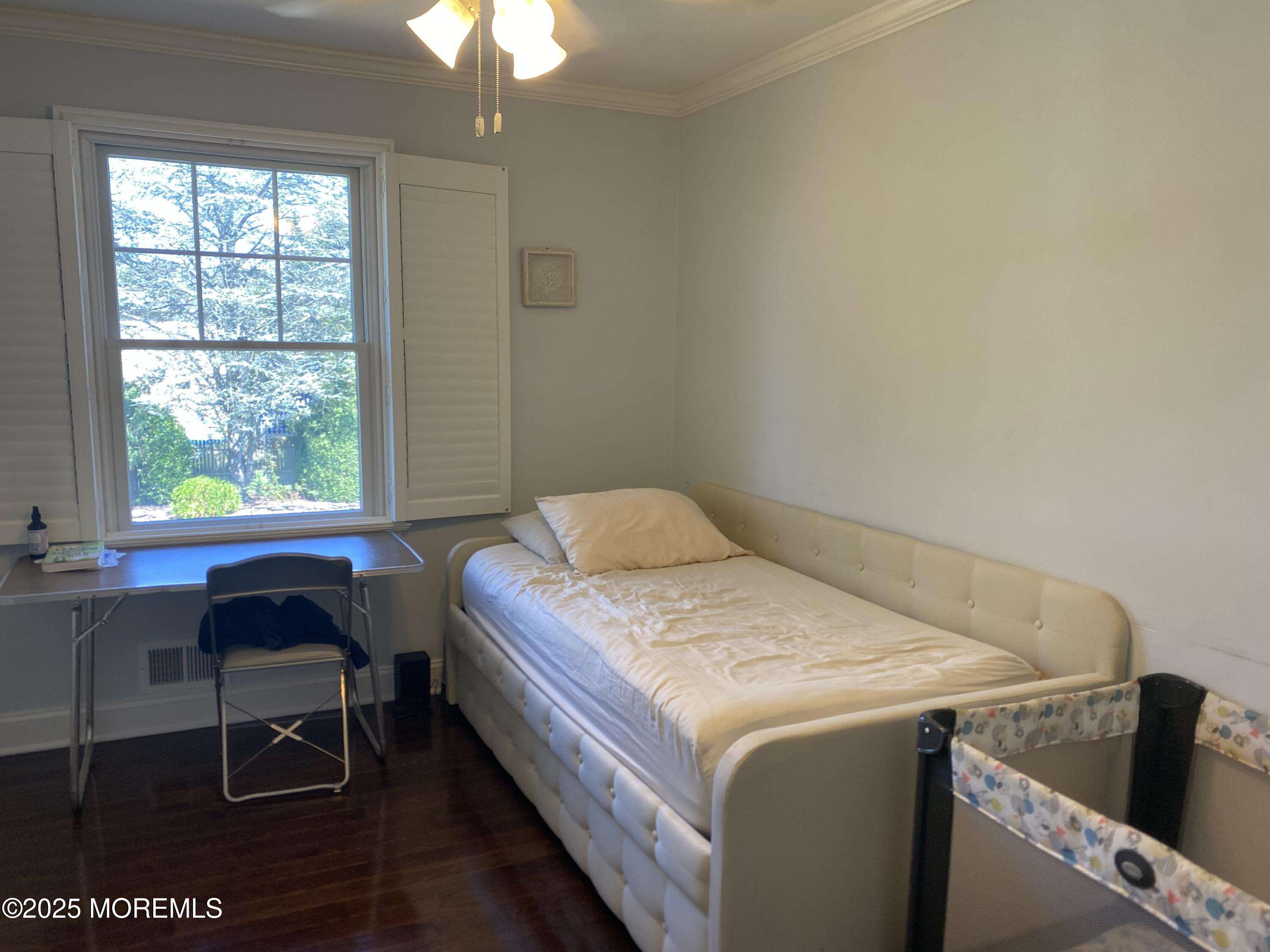 84 Forest Street West Long Branch, NJ 07764 - Photo 16 of 19 a bedroom with a bed and a window