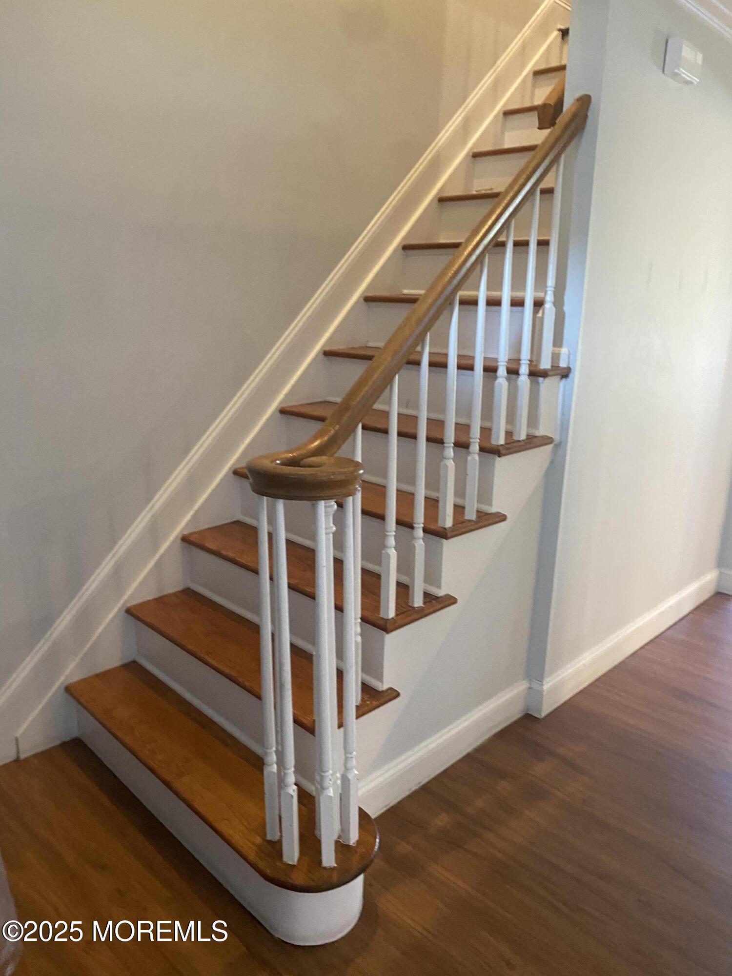 84 Forest Street West Long Branch, NJ 07764 - Photo 8 of 19 a view of entryway with wooden floor