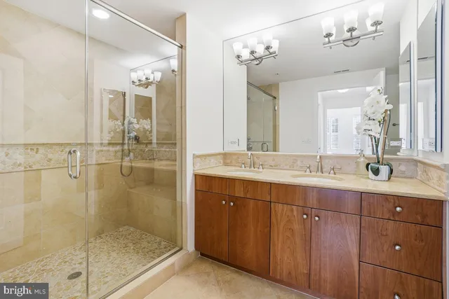 a view of storage and utility room with washer and dryer