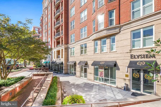 a childrens park with lots of swings and slides