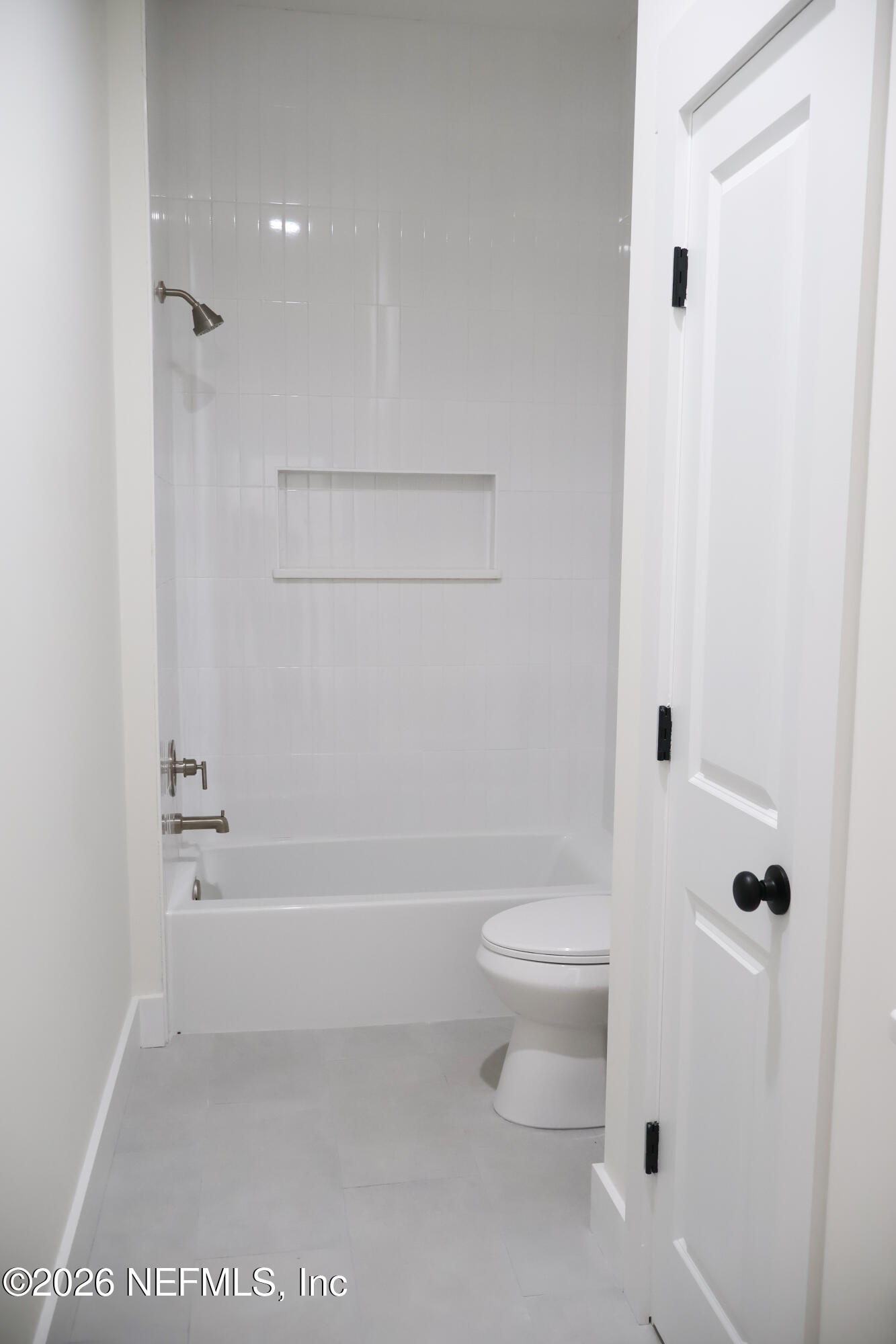 261121 Rowe Road Hilliard, FL 32046 - Photo 25 of 33 a bathroom with a toilet and a tub