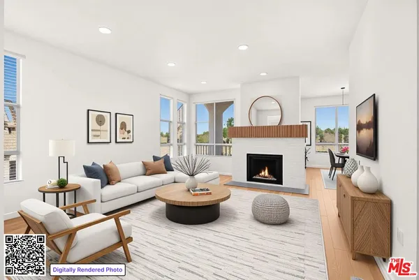 an aerial view of residential building and lake