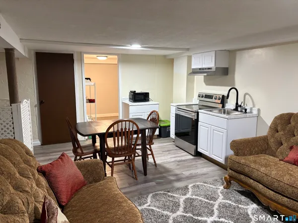 a view of a dining room with furniture