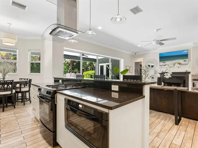 a bathroom with a double vanity sink a mirror and a shower