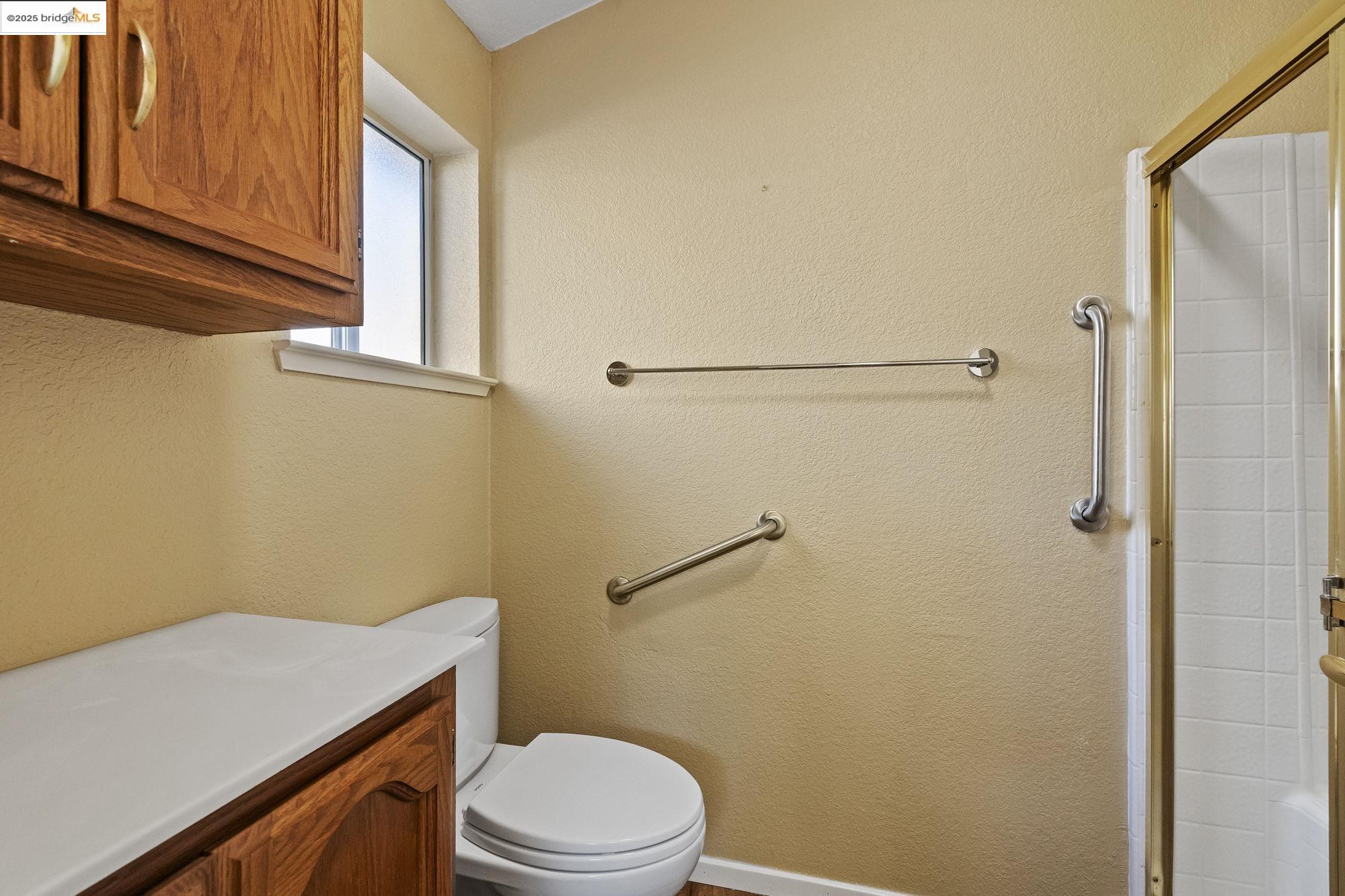 12700 Red Maple Circle, Unit 42 Sonora, CA 95370 - Photo 25 of 42 a bathroom with a sink a toilet and shower