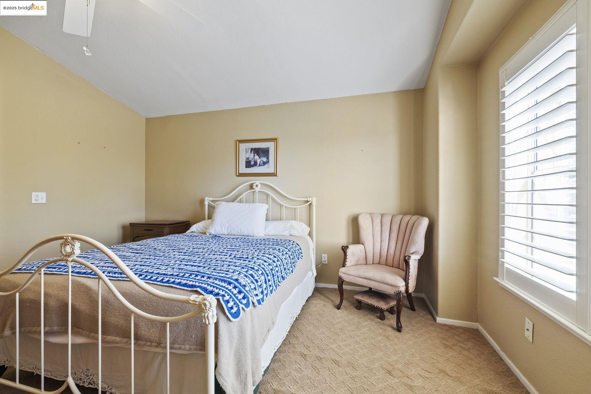 12700 Red Maple Circle, Unit 42 Sonora, CA 95370 - Photo 26 of 42 a bedroom with a bed and a window