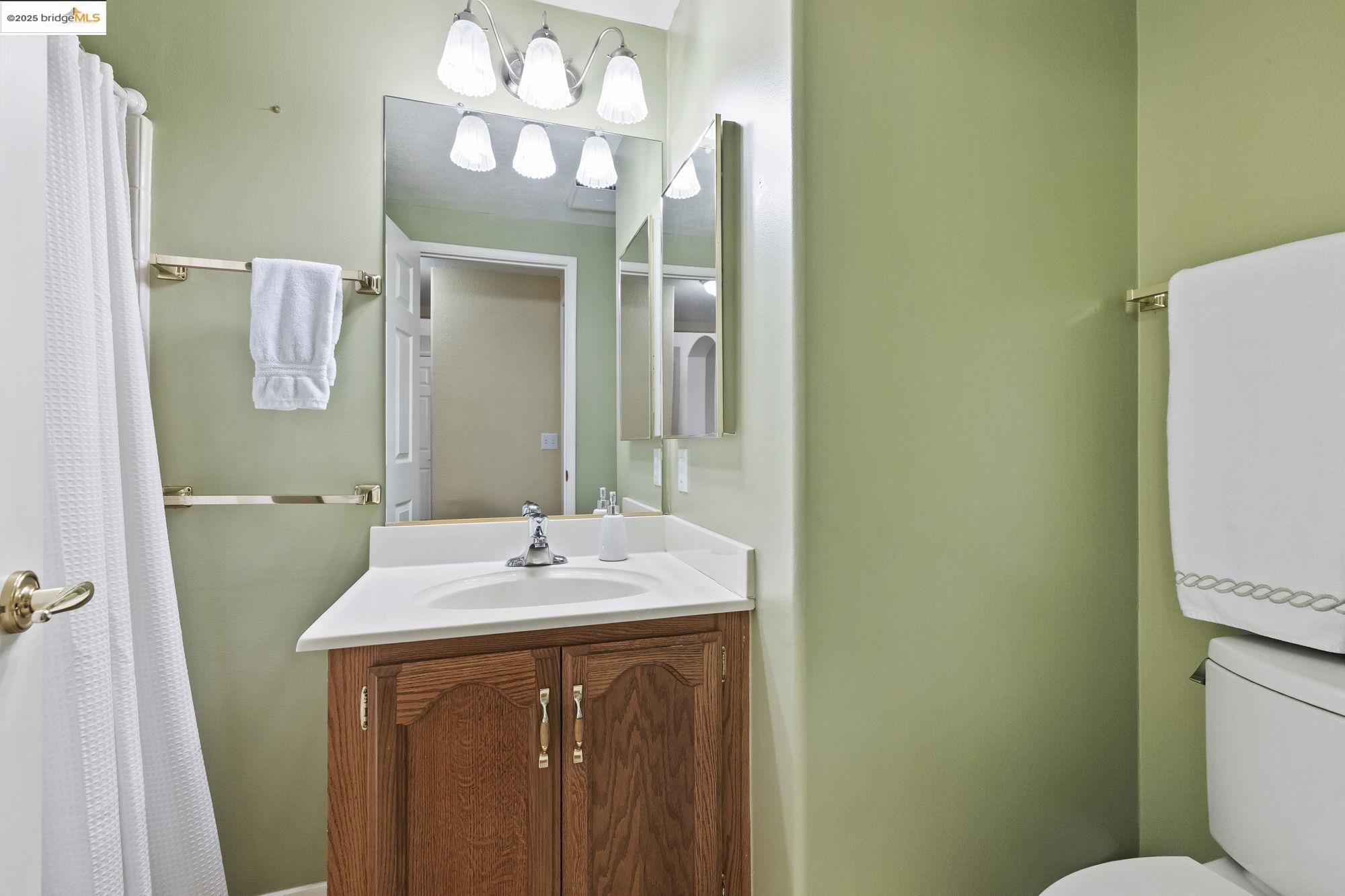 12700 Red Maple Circle, Unit 42 Sonora, CA 95370 - Photo 28 of 42 a bathroom with a sink and a mirror