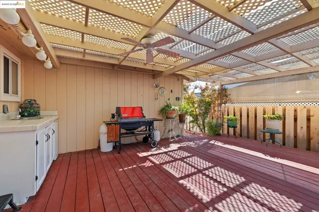 a view of a porch with wooden floor