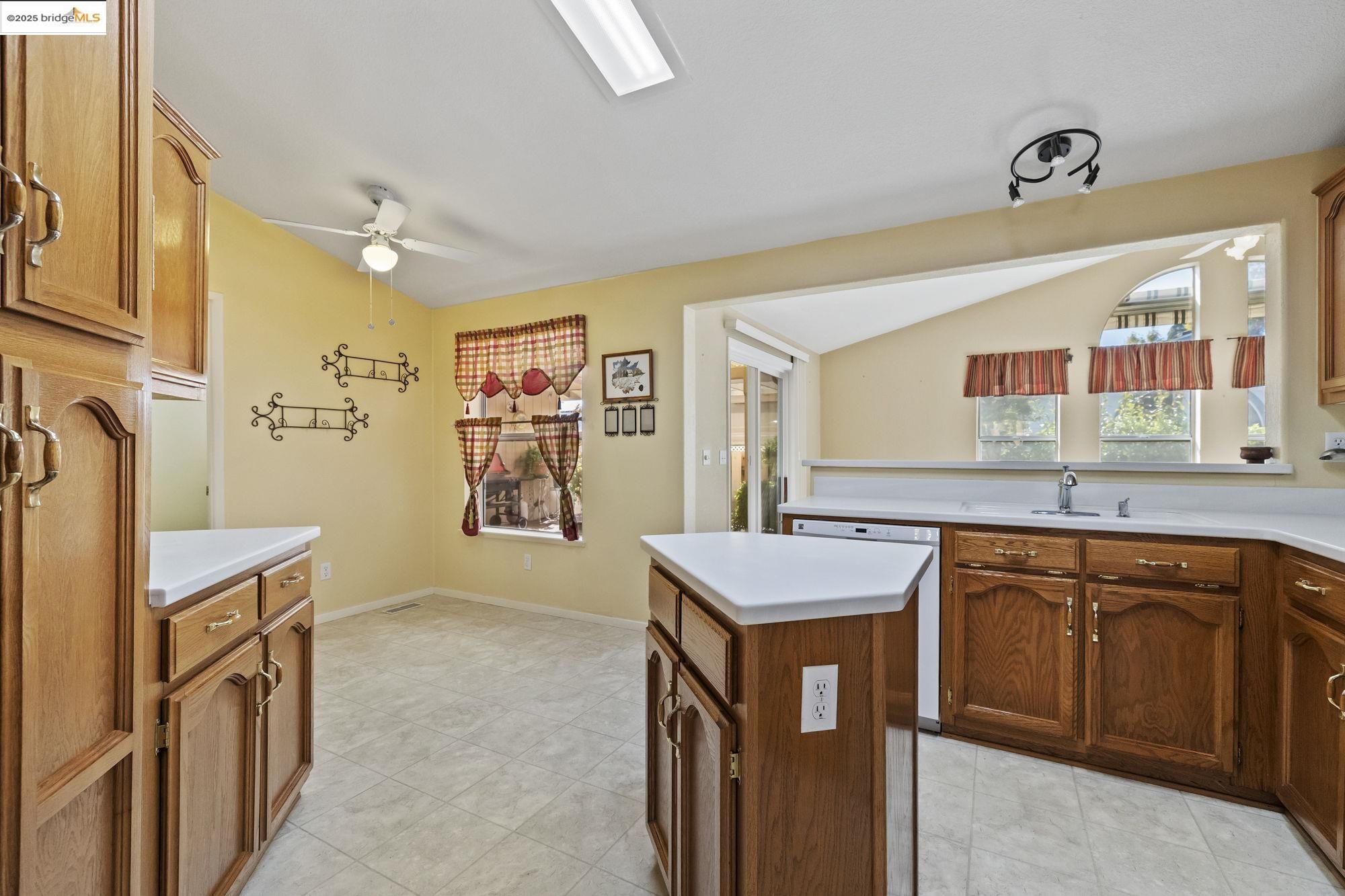 12700 Red Maple Circle, Unit 42 Sonora, CA 95370 - Photo 3 of 42 a utility room with sink dryer and washer