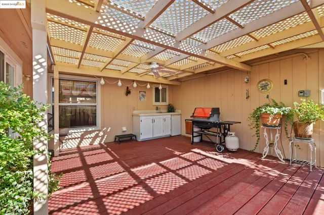 a reading room with furniture and wooden floor