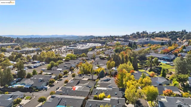 an aerial view of a city with lots of residential buildings