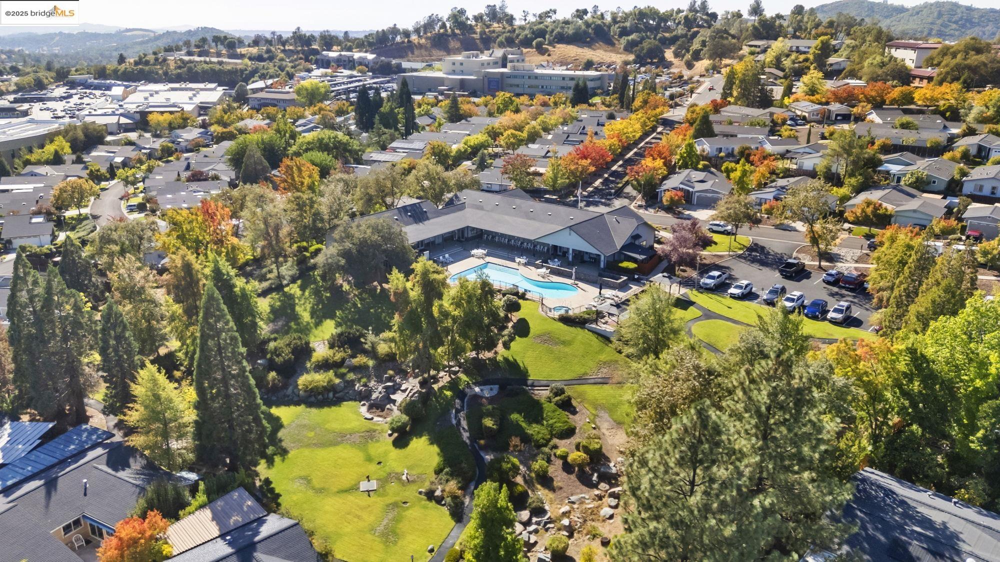 12700 Red Maple Circle, Unit 42 Sonora, CA 95370 - Photo 39 of 42 an aerial view of residential houses with swimming pool