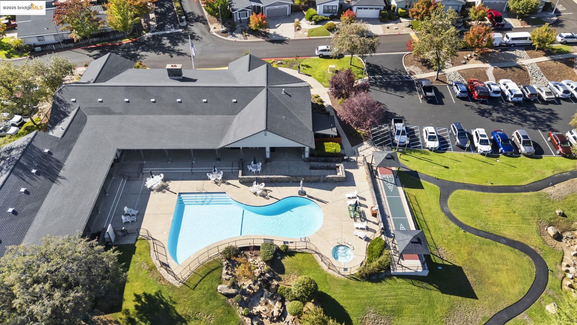 12700 Red Maple Circle, Unit 42 Sonora, CA 95370 - Photo 40 of 42 an aerial view of a swimming pool patio and outdoor seating