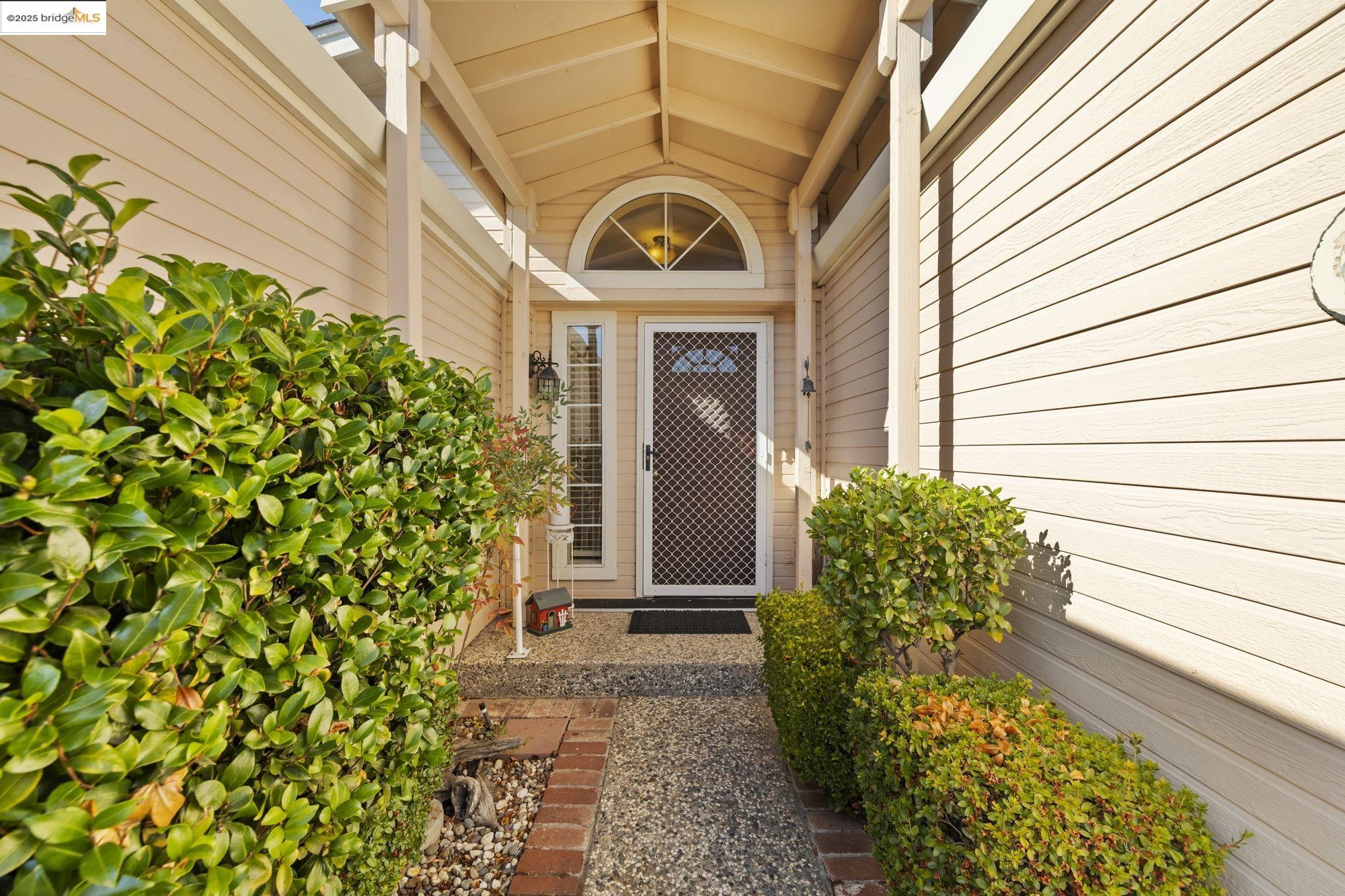 12700 Red Maple Circle, Unit 42 Sonora, CA 95370 - Photo 4 of 42 a view of a pathway with flower pots