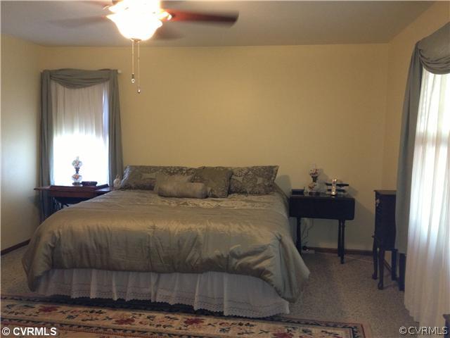 7200 Barkbridge Road Chesterfield, VA 23832 - Photo 11 of 24 a bedroom with a bed and a window