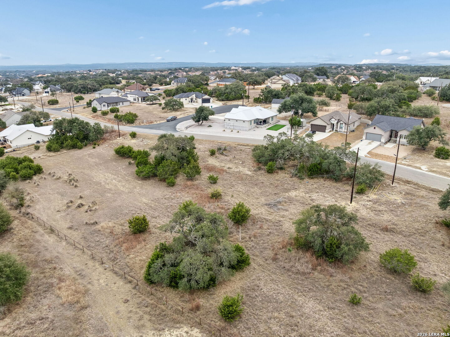 132 West Pat Dolan Blanco, TX 78606 - Photo 8 of 43 an aerial view of residential houses with outdoor space