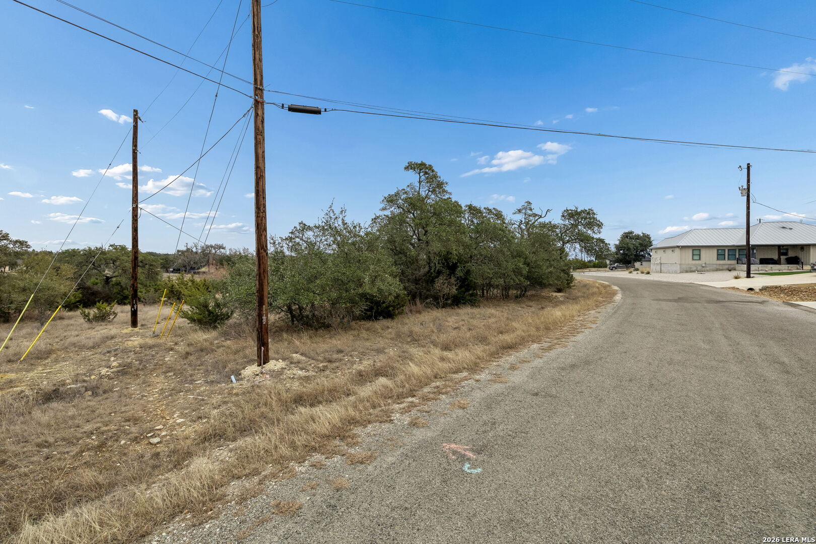 132 West Pat Dolan Blanco, TX 78606 - Photo 10 of 43 a view of a road from a yard