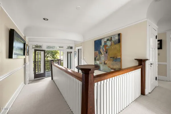 a bathroom with a sink a window and a mirror