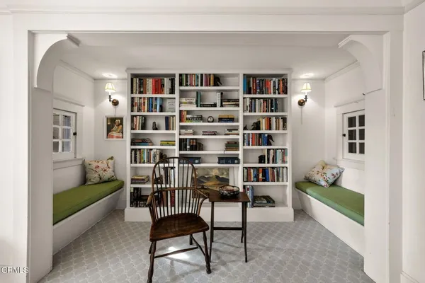 a bathroom with a sink vanity and a toilet